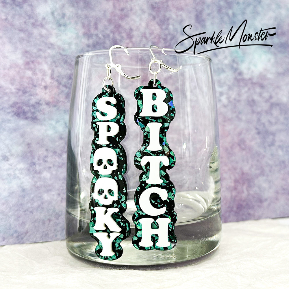 Spooky B*tch dangle earrings, laser cut acrylic, turquoise confetti glitter