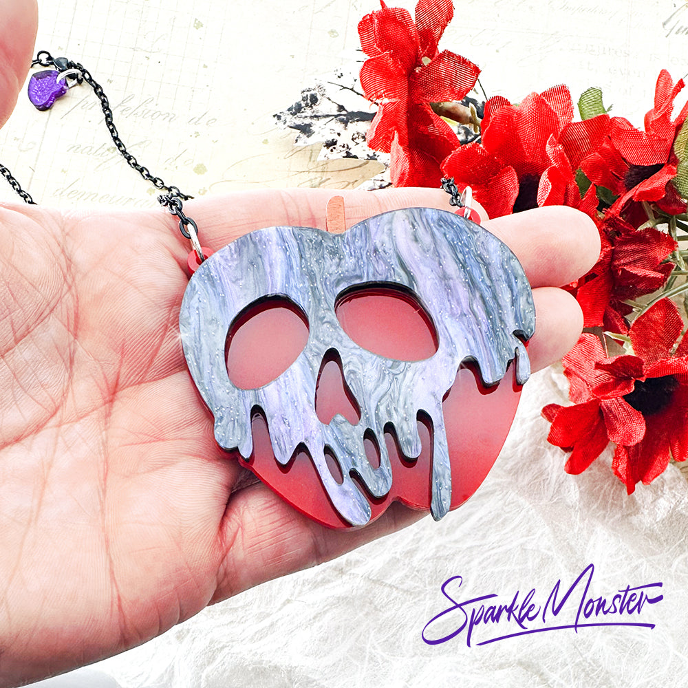 Poison Apple necklace, purple and black glitter on red