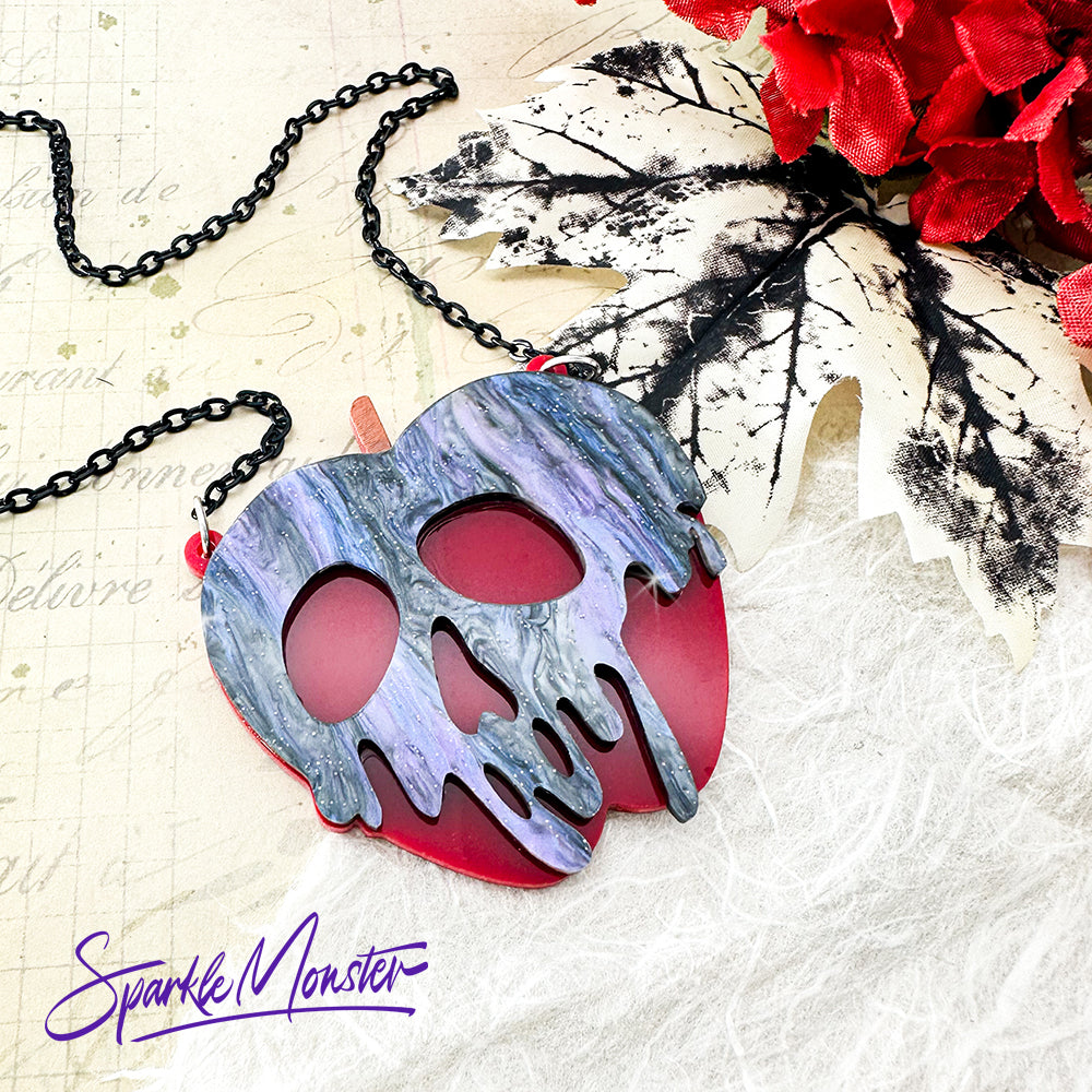 Poison Apple necklace, purple and black glitter on red