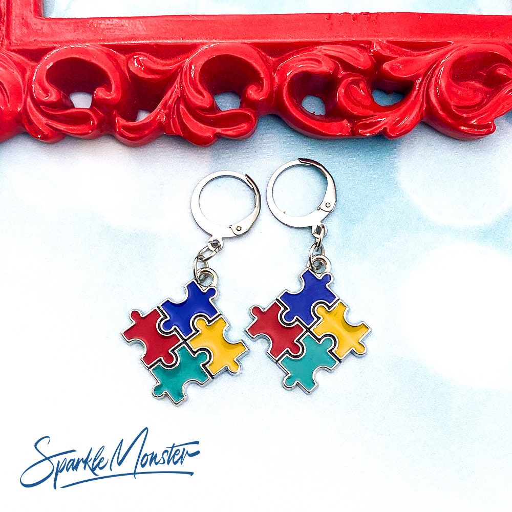 Autism Puzzle Piece Hoops or Huggies Earrings, silver toned hoops, hinged, blue, red, yellow, awareness
