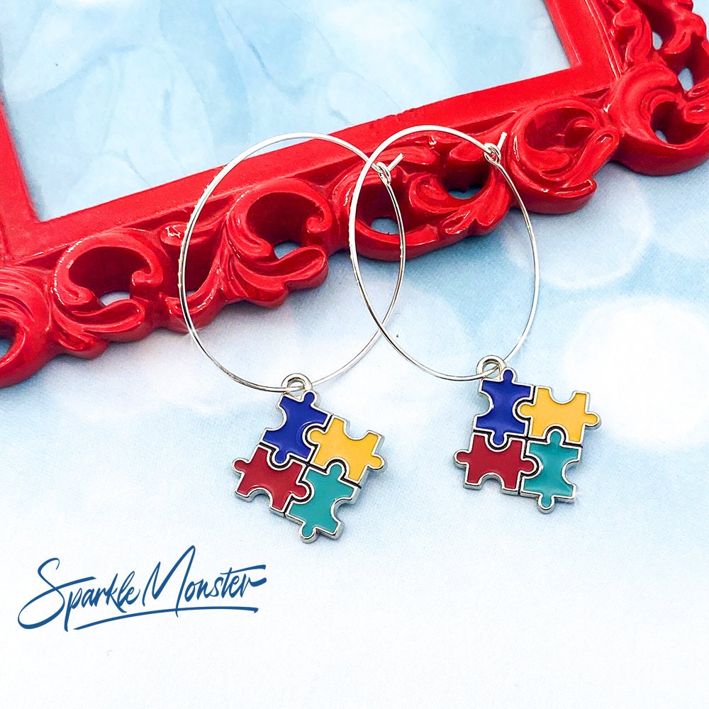 Autism Puzzle Piece Hoops or Huggies Earrings, silver toned hoops, hinged, blue, red, yellow, awareness