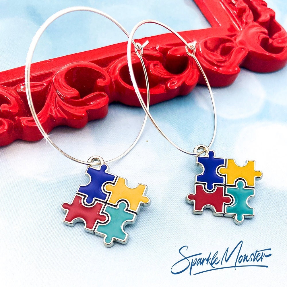 Autism Puzzle Piece Hoops or Huggies Earrings, silver toned hoops, hinged, blue, red, yellow, awareness
