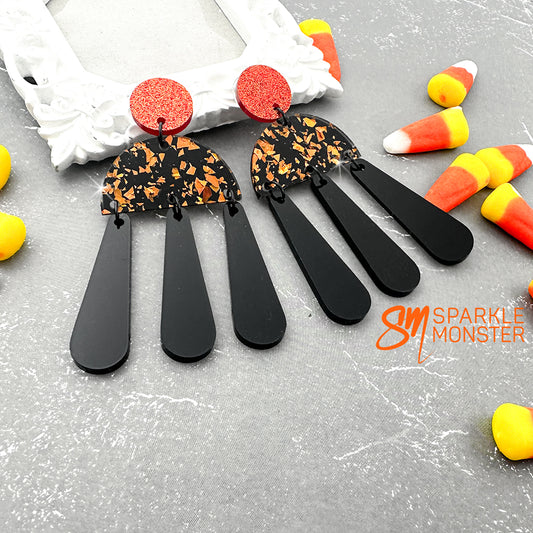 Aura dangle earrings, orange and black
