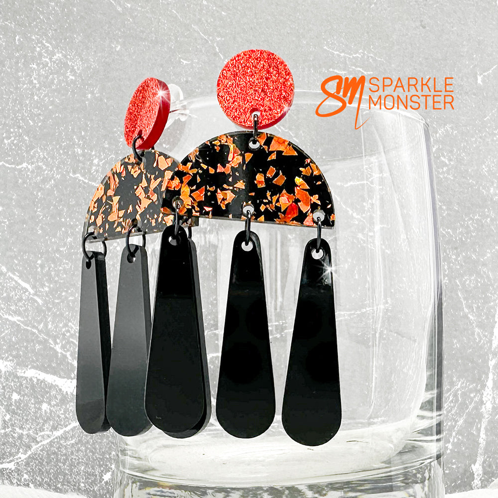 Aura dangle earrings, orange and black
