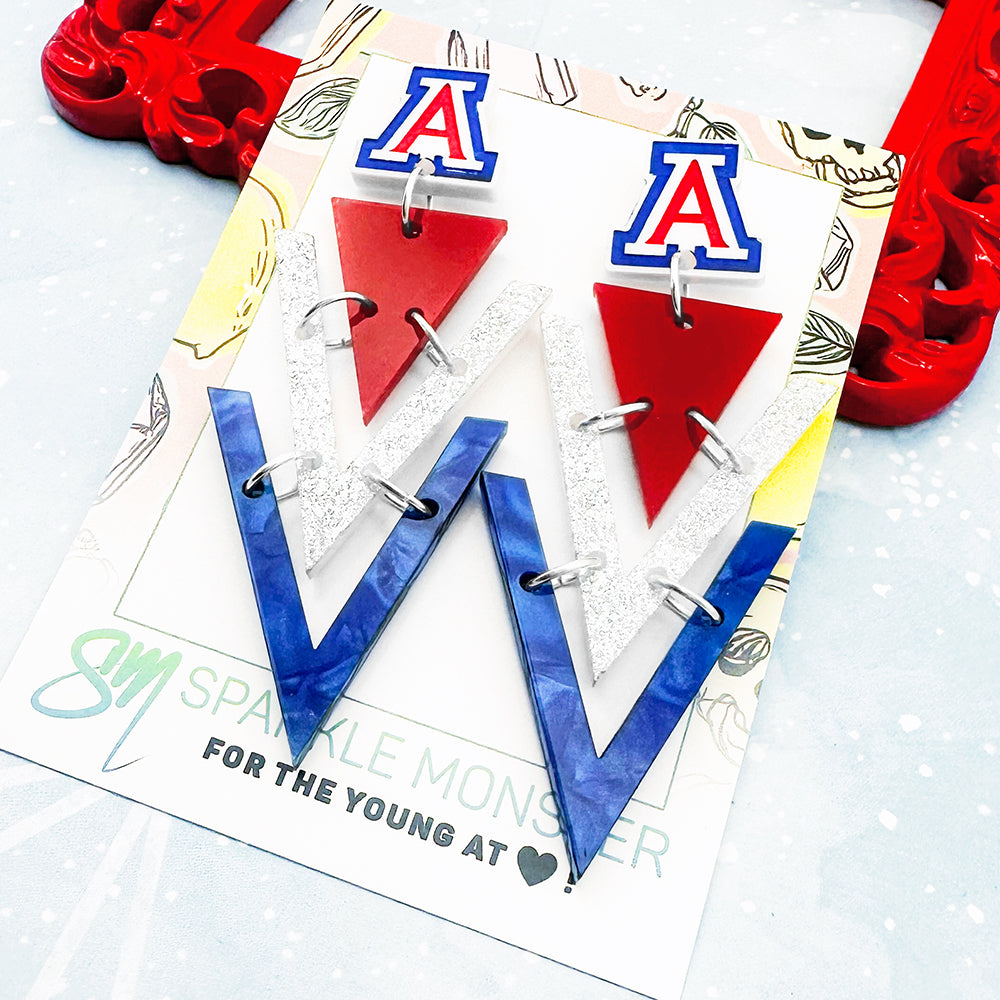 Nagel dangle earrings, U of A