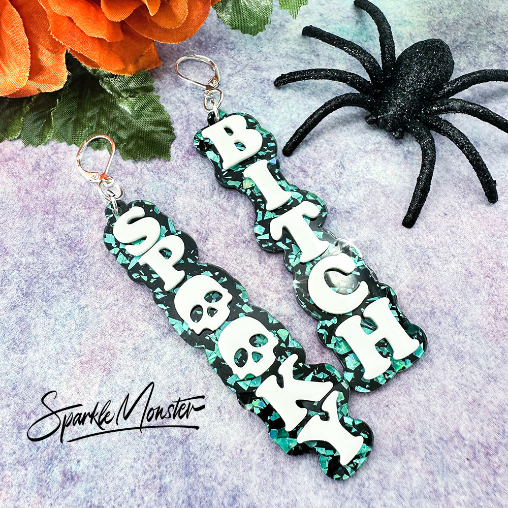 Spooky B*tch dangle earrings, laser cut acrylic, turquoise confetti glitter