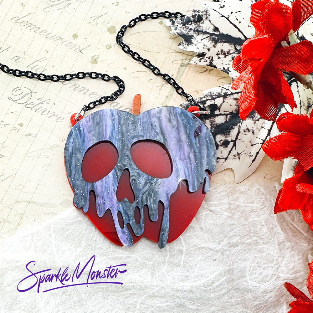 Poison Apple necklace, purple and black glitter on red