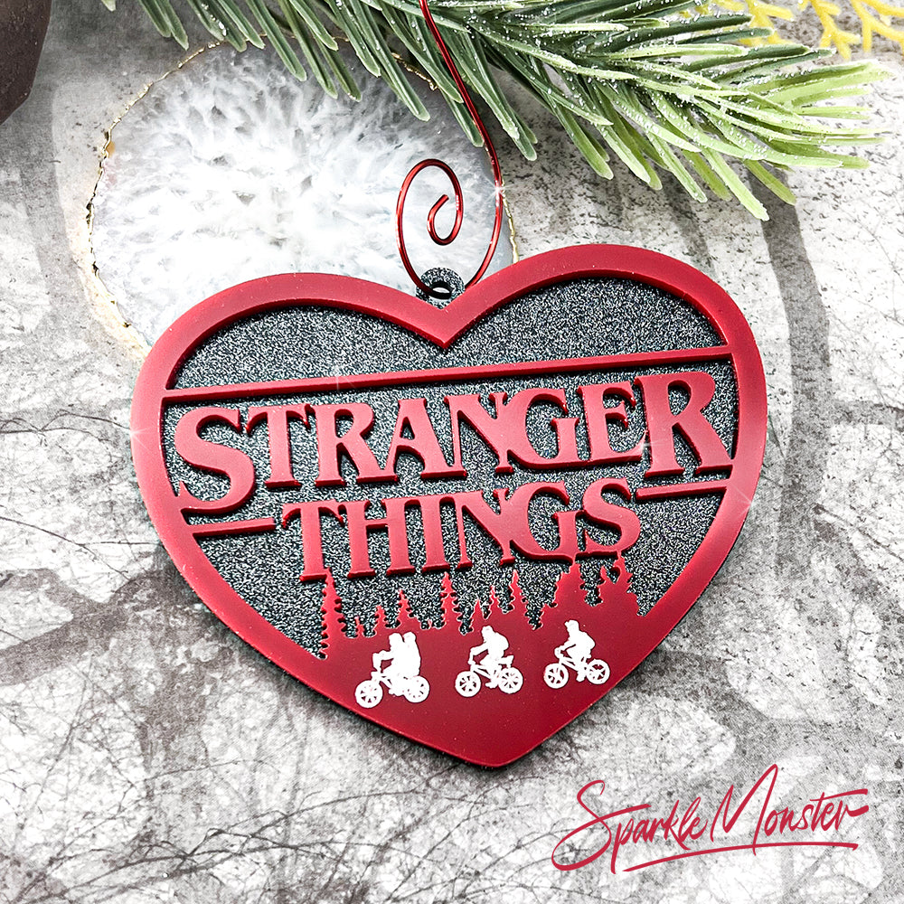 Eleven and the Gang, laser cut acrylic ornament, red on black glitter, christmas tree