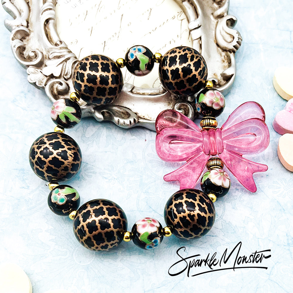 Dark Romance chunky bracelet with bubblegum beads, pink bow, floral beads