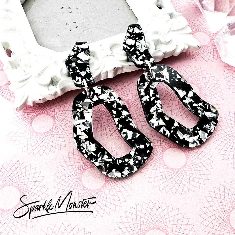 Every Occasion dangle earrings, black and silver foil confetti